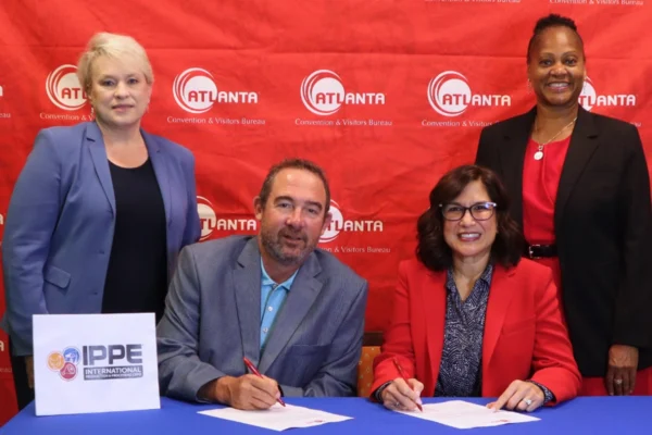 USPOULTRY and Atlanta Convention & Visitors Bureau leaders sign IPPE’s commitment to remain in Atlanta through 2036.