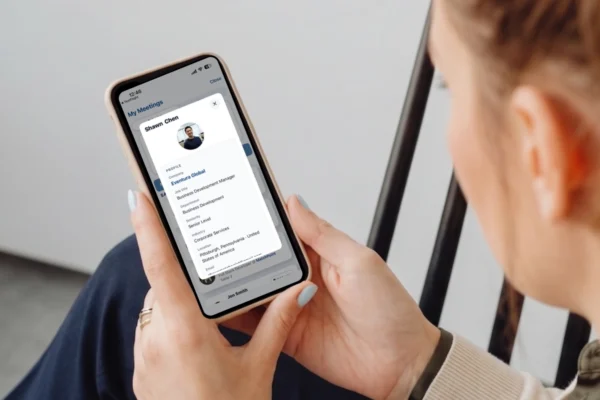 Person views a MatchPoint meeting profile on a smartphone.