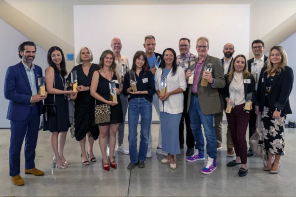 ExSys Awards winners pose with their trophies following the 2026 ceremony