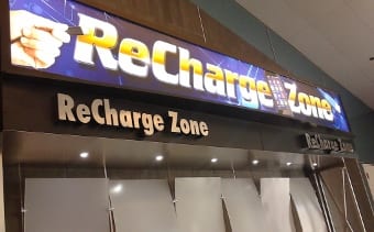 © Kristan Obeng Mobile device charging station at McCarran International Airport