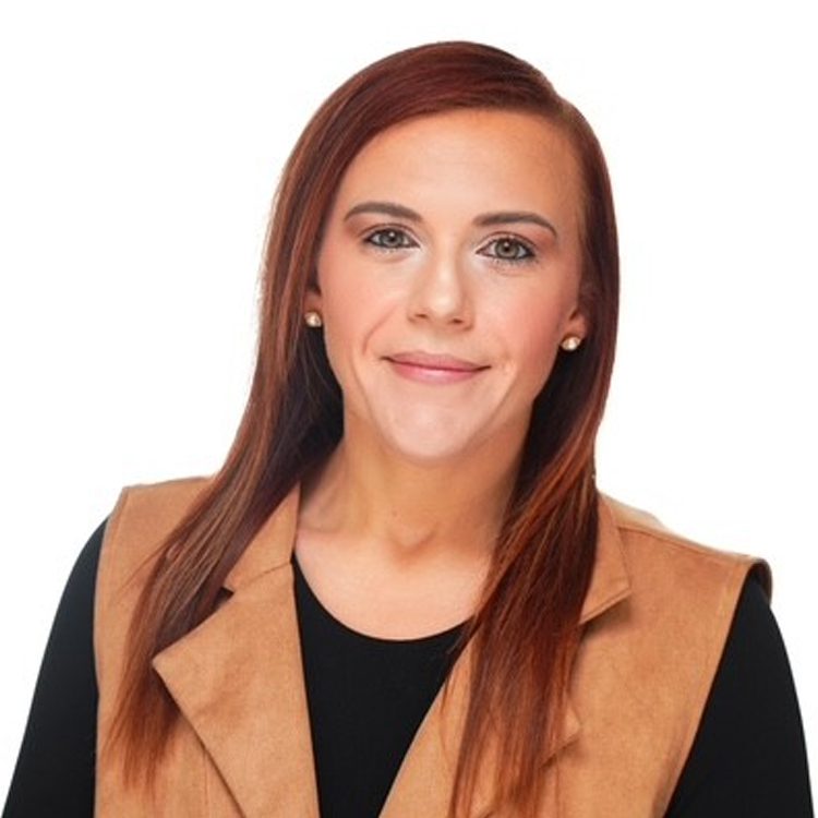 Headshot of Carly Reynolds.
