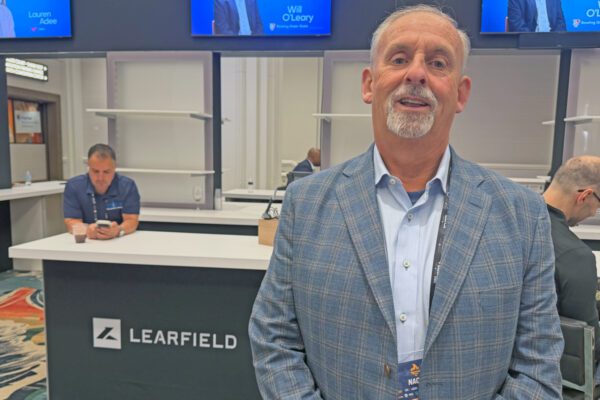 Willwork CEO Bill Nixon stands on the NACDA show floor in Las Vegas.
