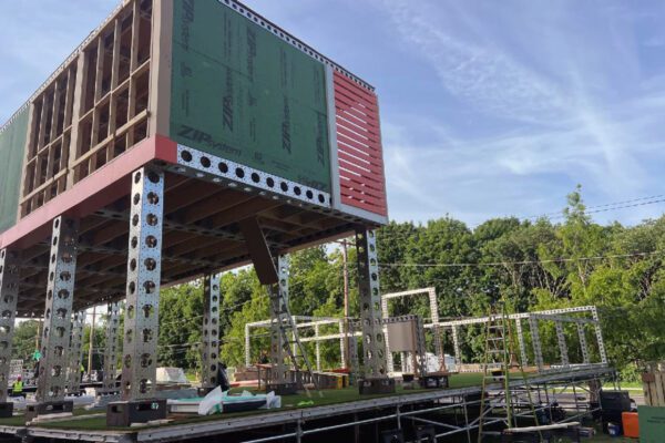 Large outdoor activation structure shown during setup for a FIFA World Cup 2026 project.