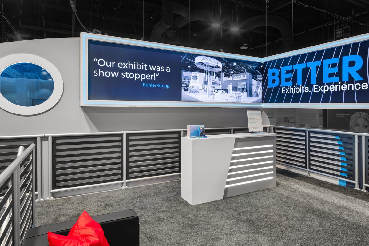 Upper-level lounge inside Apple Rock’s ExhibitorLIVE 2026 double-deck booth.