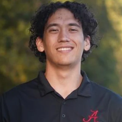 Professional portrait of Dylan Lenze, information technology intern at Exhibitus