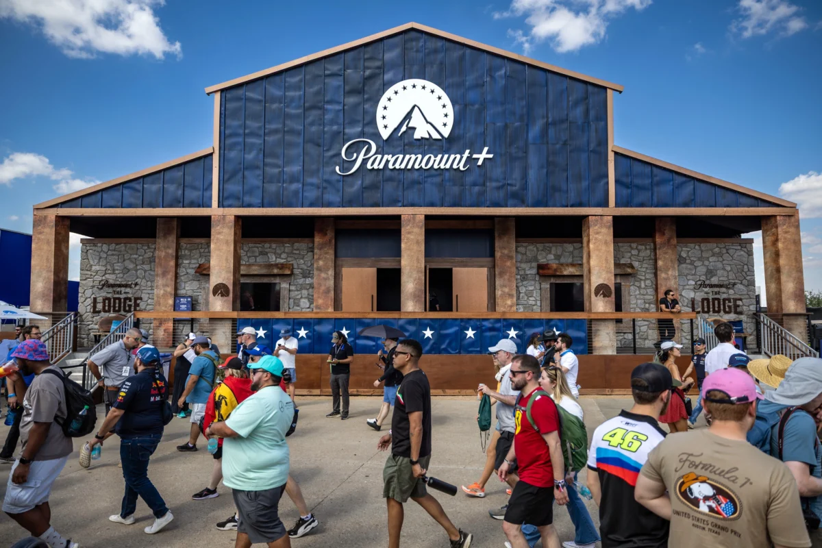 Paramount+ experiential exhibit designed as a lodge with branded architecture and event attendees