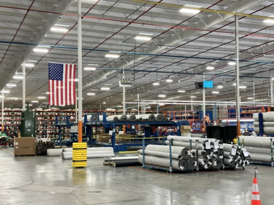 Carpet manufacturing and storage area inside the Emerald Carpets facility
