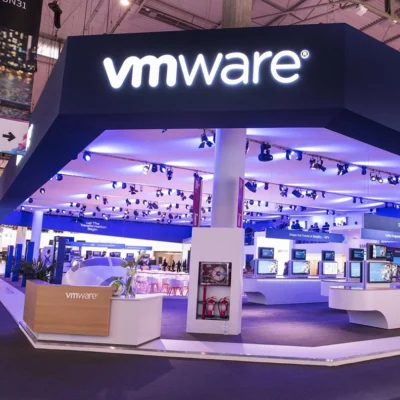 VMware exhibit booth structure with illuminated branding
