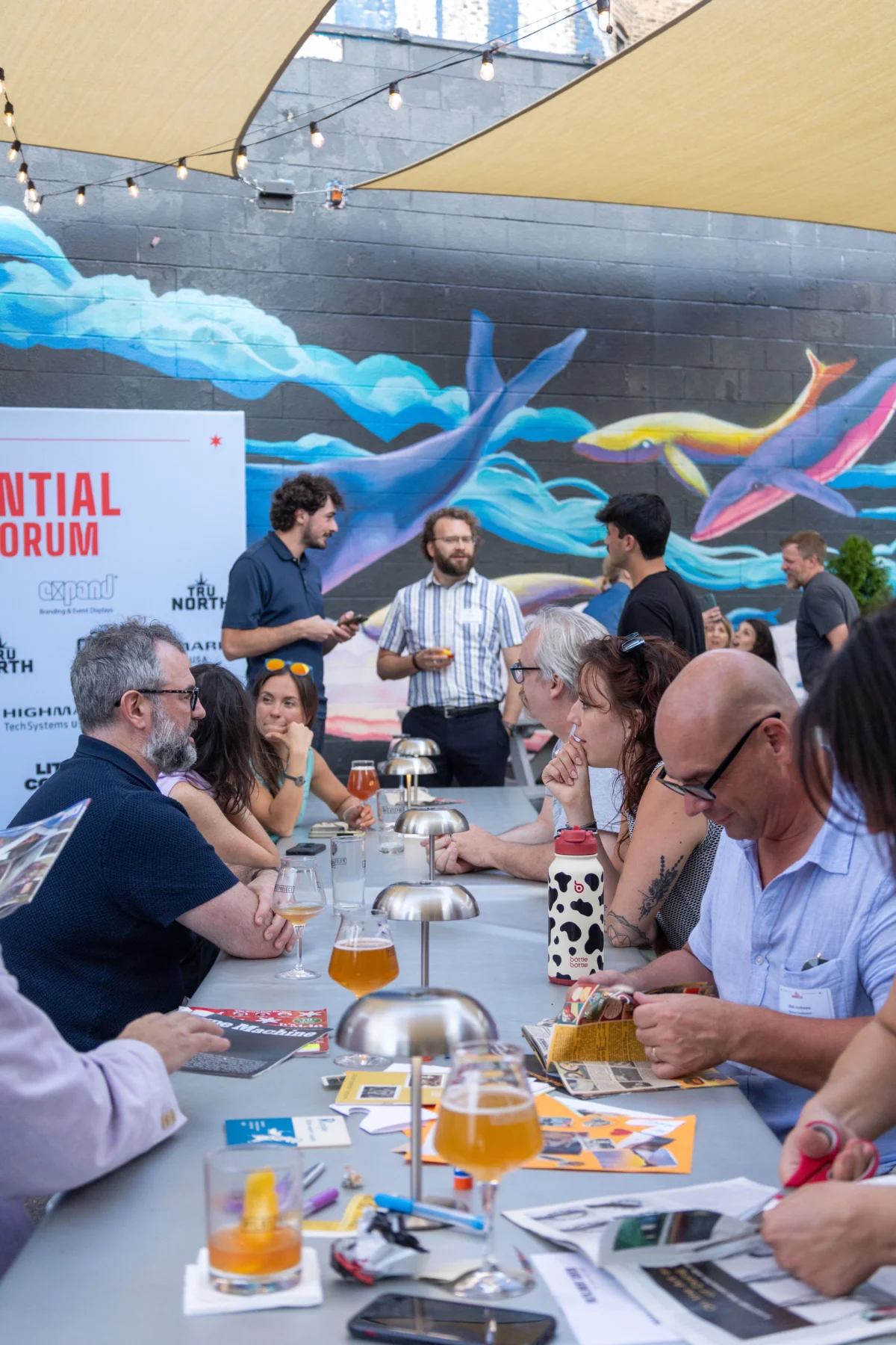 Attendees create collages during TruNorth’s Experiential Design Forum