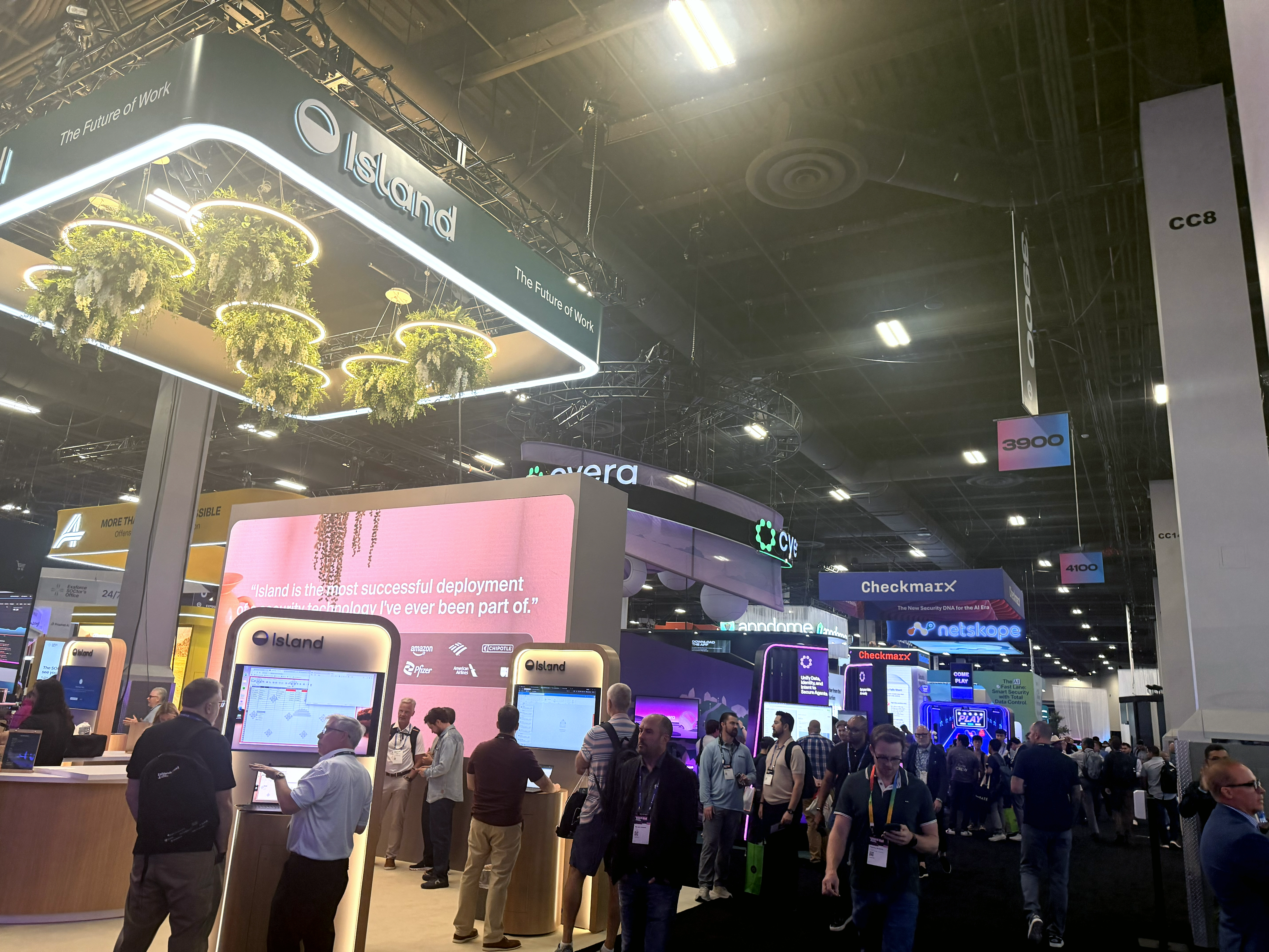 Attendees explore cybersecurity exhibits on the Black Hat USA 2026 show floor at Mandalay Bay