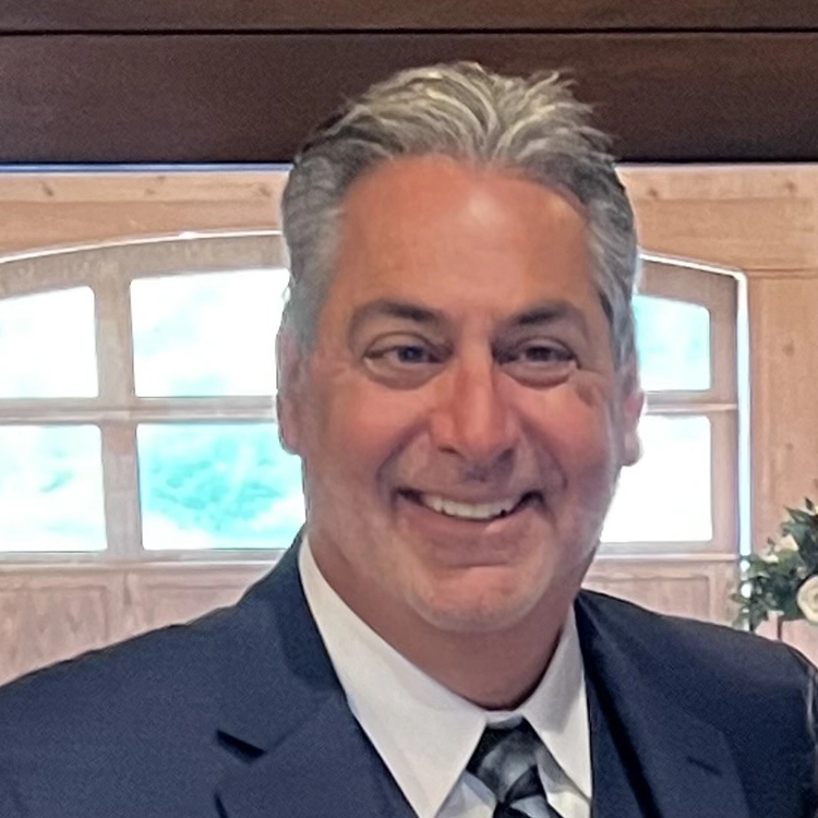 Professional portrait of Michael Seligman, vice president of sales at Graphic Image Flooring