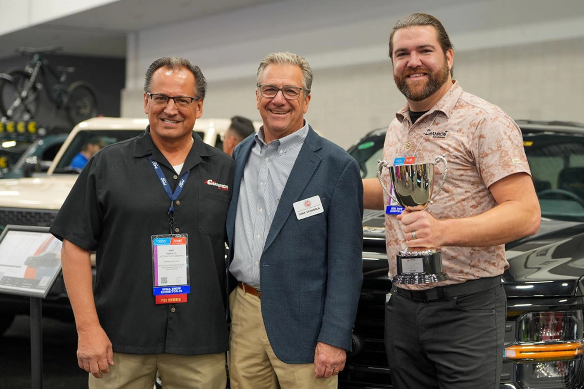 SEMA CEO Mike Spagnola with members of 2025 PRO Cup Challenge winner Automotive Concepts