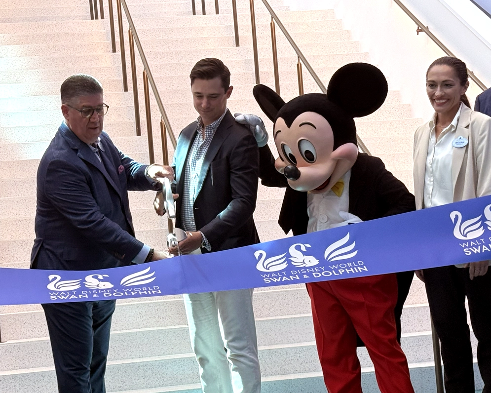 Sean Verney, Gabe Tishman, Mickey Mouse, and Megan Crosby at the Peninsula ribbon cutting