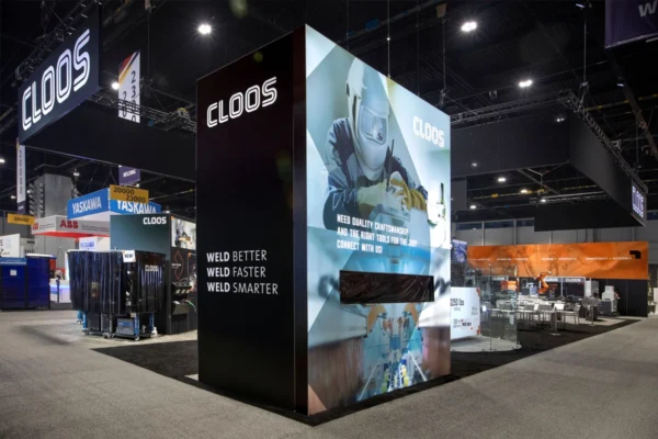 CLOOS tradeshow exhibit with overhead signs and large graphics