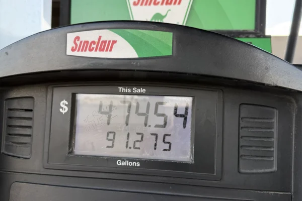 Sinclair fuel pump display showing a $445.54 sale for 91.275 gallons
