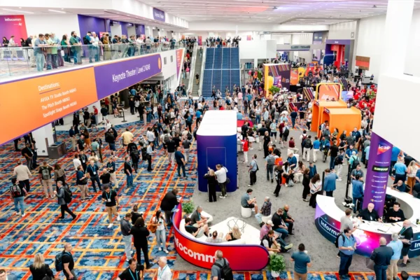 Attendees fill the InfoComm 2026 show floor and networking areas