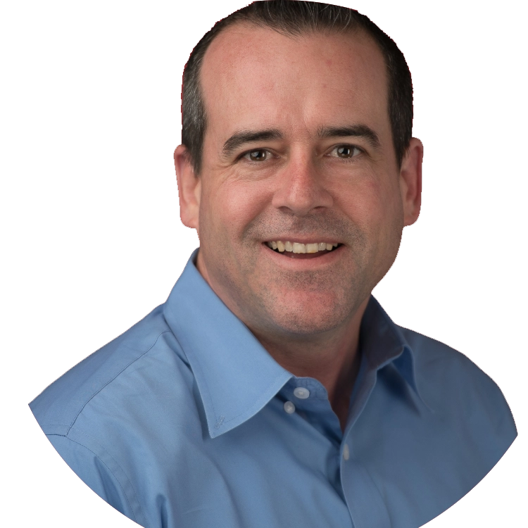 Marc Santos smiles while wearing a blue button-down shirt.
